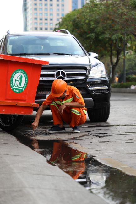 Septic service technician working on a system